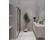 Contemporary bathroom with double vanity and marble flooring at 2100 4Th S St, St Petersburg, FL 33705