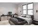 Spacious bedroom with large windows, a desk and a comfortable bed at 2100 4Th S St, St Petersburg, FL 33705