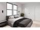 Comfortable bedroom with a king-size bed and plenty of natural light at 2100 4Th S St, St Petersburg, FL 33705