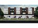 Modern townhouses with sleek design, private entrances, and landscaped yards at 2100 4Th S St, St Petersburg, FL 33705