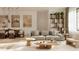 Spacious living area with large windows, neutral decor, and stylish furniture at 2100 4Th S St, St Petersburg, FL 33705