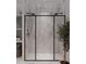 Modern frameless shower with marble tile and rainfall shower head at 2100 4Th S St, St Petersburg, FL 33705