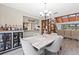 Dining room features marble table and built-in shelving at 220 Dale Pl, Oldsmar, FL 34677