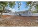 View of the home's exterior and backyard at 2307 Mary Sue St, Largo, FL 33774
