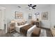 Bedroom with ceiling fan, wood-look floors, and neutral decor at 2307 Mary Sue St, Largo, FL 33774