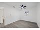 Bright bedroom with ceiling fan and wood-look flooring at 2307 Mary Sue St, Largo, FL 33774