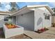 Gray house exterior with updated landscaping at 2307 Mary Sue St, Largo, FL 33774