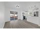 Bright kitchen with white cabinets, quartz countertops, and stainless steel appliances at 2307 Mary Sue St, Largo, FL 33774