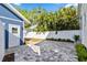 Private backyard with a spacious paved patio and shed at 235 11Th Ne Ave, St Petersburg, FL 33701