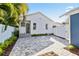 Home's exterior boasts a large backyard and paved patio at 235 11Th Ne Ave, St Petersburg, FL 33701