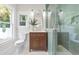 Spa-like bathroom with a walk-in shower and modern vanity at 235 11Th Ne Ave, St Petersburg, FL 33701
