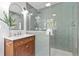 Modern bathroom with a walk-in shower and hexagon tile floor at 235 11Th Ne Ave, St Petersburg, FL 33701
