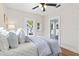 Bedroom with en-suite bathroom and hardwood floors at 235 11Th Ne Ave, St Petersburg, FL 33701