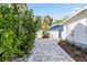 Cobblestone driveway leads to the home and garage at 235 11Th Ne Ave, St Petersburg, FL 33701