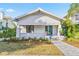 Charming bungalow with landscaped yard and brick walkway at 235 11Th Ne Ave, St Petersburg, FL 33701