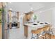 Updated kitchen featuring white cabinets and hex tile at 235 11Th Ne Ave, St Petersburg, FL 33701