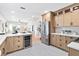 Modern kitchen with stainless steel appliances and white hexagonal tile floor at 235 11Th Ne Ave, St Petersburg, FL 33701