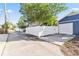 Side yard view showing access to garage and alley at 235 11Th Ne Ave, St Petersburg, FL 33701