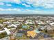 Aerial view of community, pool, tennis court, and more at 2430 Florentine Way # 38, Clearwater, FL 33763