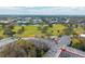 Aerial view of community and surrounding golf course at 2430 Florentine Way # 38, Clearwater, FL 33763
