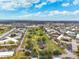 Wide aerial view of community and surrounding area at 2430 Florentine Way # 38, Clearwater, FL 33763