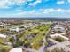 Aerial view of community, showcasing landscaping and buildings at 2430 Florentine Way # 38, Clearwater, FL 33763