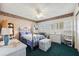 Bright bedroom with white furniture and window seating at 2430 Florentine Way # 38, Clearwater, FL 33763