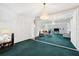 Dining area with mirrored wall and a chandelier at 2430 Florentine Way # 38, Clearwater, FL 33763