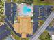 Community pool and surrounding parking area at 2430 Florentine Way # 38, Clearwater, FL 33763