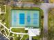 Aerial view of community tennis and pickleball courts at 2430 Florentine Way # 38, Clearwater, FL 33763