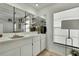 Elegant wet bar with mirrored backsplash, sleek countertops, and stylish fixtures at 2603 Royal Ridge Dr, Spring Hill, FL 34606