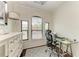 Home office with built-in desk and plenty of natural light at 2749 Via Cipriani # 1034A, Clearwater, FL 33764