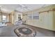 Enclosed patio with bicycle and decorative rug at 322 S Port Royal Ln, Apollo Beach, FL 33572