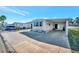 Mobile home with carport and paved driveway at 322 S Port Royal Ln, Apollo Beach, FL 33572