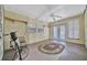 Bright Florida room with French doors and tile flooring at 322 S Port Royal Ln, Apollo Beach, FL 33572