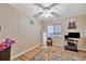 Home office with ceiling fan, rug, and built-in shelving at 322 S Port Royal Ln, Apollo Beach, FL 33572