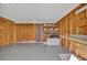 Unfinished workshop with built-in shelving and workbench at 322 S Port Royal Ln, Apollo Beach, FL 33572