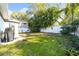 Large backyard with grassy area and privacy fence at 3621 19Th Street N, St Petersburg, FL 33713