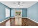 Bright bedroom with hardwood floors and access to a patio at 3621 19Th Street N, St Petersburg, FL 33713