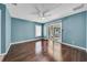 Spacious bedroom with hardwood floors and sliding glass doors at 3621 19Th Street N, St Petersburg, FL 33713