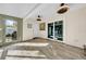 Sun-drenched sunroom with light wood-look tile floors and many windows at 3621 19Th Street N, St Petersburg, FL 33713