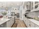 Modern kitchen with stainless steel appliances and granite countertops at 4041 Woodland Retreat Blvd, New Port Richey, FL 34655