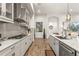 Modern kitchen with stainless steel appliances and granite countertops at 4041 Woodland Retreat Blvd, New Port Richey, FL 34655