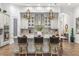 Modern kitchen with a large island and breakfast bar at 4041 Woodland Retreat Blvd, New Port Richey, FL 34655