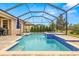 Screened pool and spa with paver deck at 4041 Woodland Retreat Blvd, New Port Richey, FL 34655