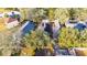 House with solar panels, pool, and surrounding trees at 410 Pine Pointe Ct, Seffner, FL 33584