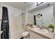 Updated bathroom with a tub, shower, and stylish decor at 410 Pine Pointe Ct, Seffner, FL 33584