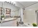 Clean bathroom with shower/tub combo and updated vanity at 410 Pine Pointe Ct, Seffner, FL 33584