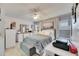 Spacious bedroom with plush bedding and large window at 410 Pine Pointe Ct, Seffner, FL 33584