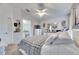 Bright bedroom with ensuite bathroom access and ceiling fan at 410 Pine Pointe Ct, Seffner, FL 33584